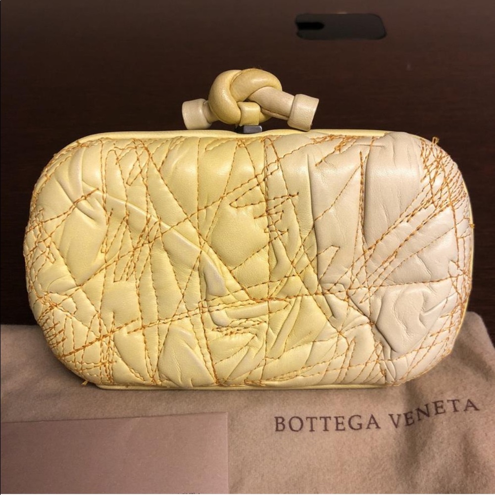 bottega veneta knot clutch in ivory yellow ombré